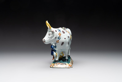 A pair of polychrome Dutch Delft milking groups, 18th C.