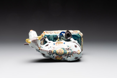 A pair of polychrome Dutch Delft milking groups, 18th C.