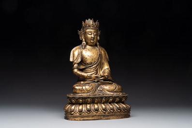 A large Sino-Tibetan gilt bronze Buddha, Xuande mark, possibly Ming
