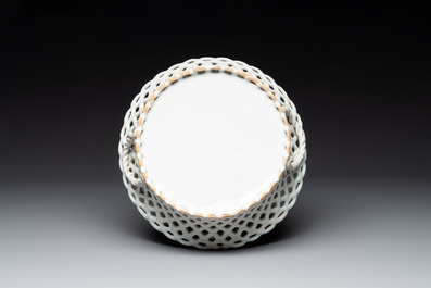 A round white-glazed reticulated pottery basket, Brussels or France, 18th C.