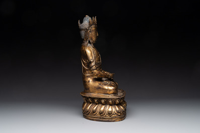 A large Sino-Tibetan gilt bronze Buddha, Xuande mark, possibly Ming