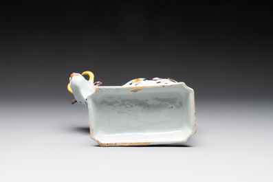 A pair of polychrome Dutch Delft milking groups, 18th C.