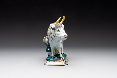A pair of polychrome Dutch Delft milking groups, 18th C.