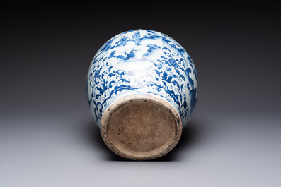 A large Chinese blue and white baluster vase with figures and landscapes, Transitional period