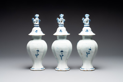 A blue and white Dutch Delft garniture of five vases and covers, 2nd half 18th C.