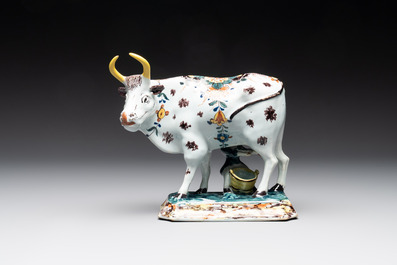 A pair of polychrome Dutch Delft milking groups, 18th C.