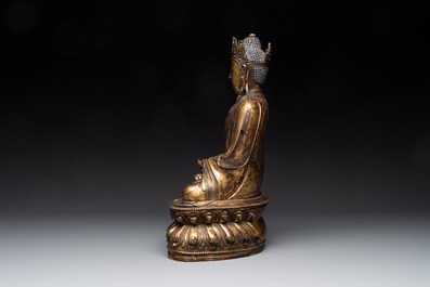 A large Sino-Tibetan gilt bronze Buddha, Xuande mark, possibly Ming
