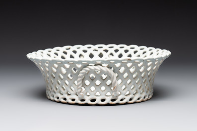 A round white-glazed reticulated pottery basket, Brussels or France, 18th C.
