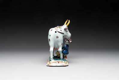 A pair of polychrome Dutch Delft milking groups, 18th C.
