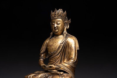 A large Sino-Tibetan gilt bronze Buddha, Xuande mark, possibly Ming