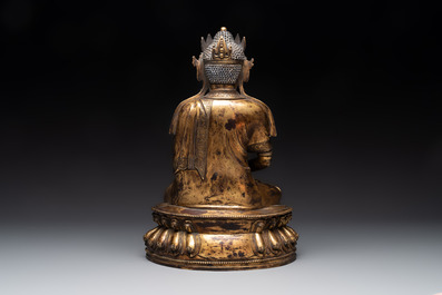 A large Sino-Tibetan gilt bronze Buddha, Xuande mark, possibly Ming