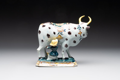 A pair of polychrome Dutch Delft milking groups, 18th C.