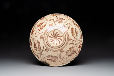 A Hispano-Moresque lustre-glazed dish with stylized floral design, Spain, 16th C.