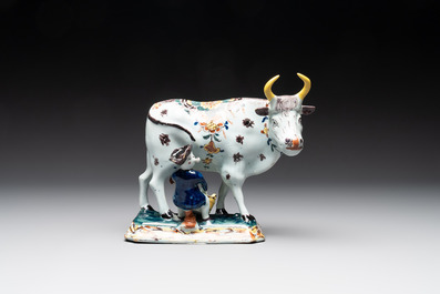 A pair of polychrome Dutch Delft milking groups, 18th C.