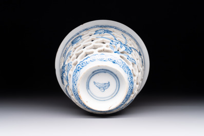 A pair of Chinese blue and white salts and a reticulated double-walled cup, Kangxi