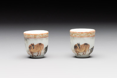 A pair of rare Chinese gilt-decorated grisaille and iron-red miniature 'horse' cups, Yongzheng/Qianlong
