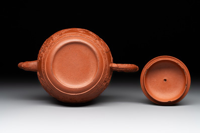 A Chinese Yixing stoneware 'phoenixes and peonies' teapot and cover, Kangxi