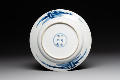 A Chinese blue and white 'rabbit hunt' dish, Chenghua mark, Kangxi