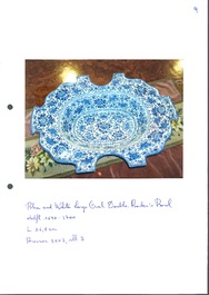 A very rare and large blue and white Dutch Delft double barber's bowl with floral design, late 17th C.