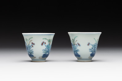 A pair of Chinese doucai 'narcissus' wine cups, Guangxu mark and of the period