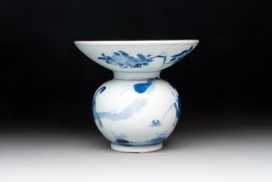 A Chinese blue and white spittoon with figural design, Kangxi