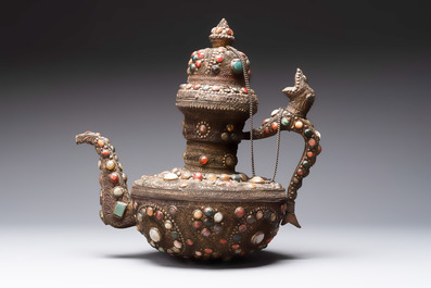 A massive Tibetan stone-inlaid copper filigree ewer and cover, 19/20th C.