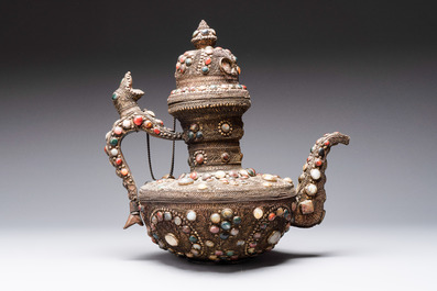 A massive Tibetan stone-inlaid copper filigree ewer and cover, 19/20th C.