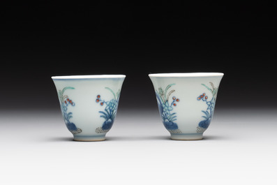 A pair of Chinese doucai 'narcissus' wine cups, Guangxu mark and of the period