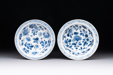 A pair of Chinese blue and white salts and a reticulated double-walled cup, Kangxi