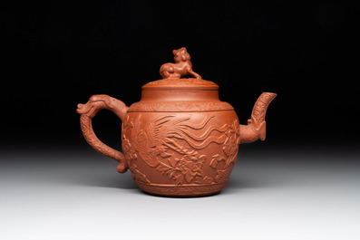 A Chinese Yixing stoneware 'phoenixes and peonies' teapot and cover, Kangxi