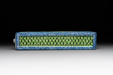 A Chinese blue- and green-enamelled reticulated incense stick holder, 19th C.