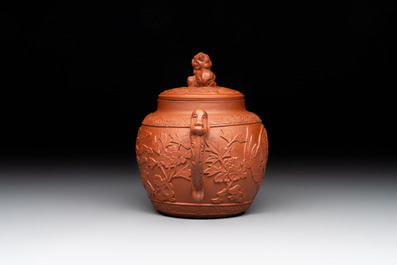 A Chinese Yixing stoneware 'phoenixes and peonies' teapot and cover, Kangxi