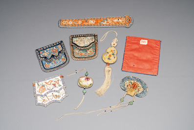 Eight Chinese embroidered silk pouches, 19th C.