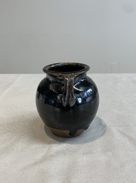 A Chinese brown-glazed vase and a black-glazed jar, Song/Ming