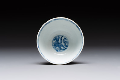 Four Chinese blue and white bowls, two cups and a plate, Ming
