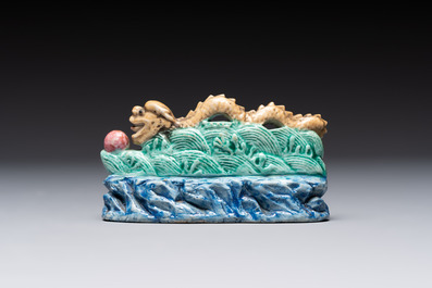 Six Chinese porcelain and glass brush rests, 19/20th C.