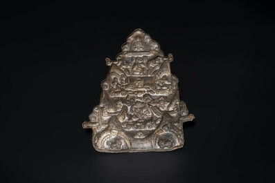 Four Tibetan bronze and wooden phurbas, a 'kapala' or skull-bowl and two silver ornaments, 19th C.
