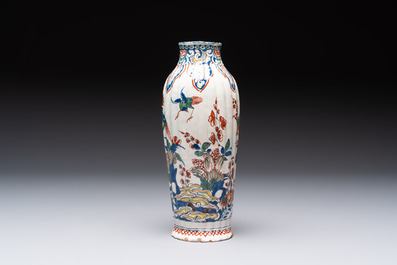 A fine polychrome Dutch Delft cashmere palette ribbed vase with birds among flowering branches, early 18th C.