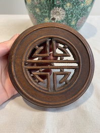 A Chinese verte biscuit 'lotus scroll' jar with wooden cover, Qing