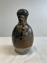 A Chinese brown-glazed vase and a black-glazed jar, Song/Ming