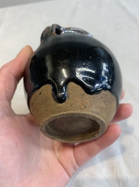 A Chinese brown-glazed vase and a black-glazed jar, Song/Ming