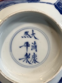 A Chinese blue and white square bowl with ladies in a garden, Kangxi mark and of the period