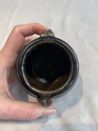 A Chinese brown-glazed vase and a black-glazed jar, Song/Ming