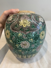 A Chinese verte biscuit 'lotus scroll' jar with wooden cover, Qing