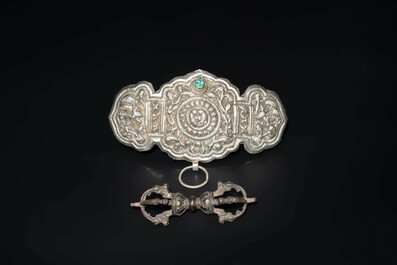 Four Tibetan bronze and wooden phurbas, a 'kapala' or skull-bowl and two silver ornaments, 19th C.