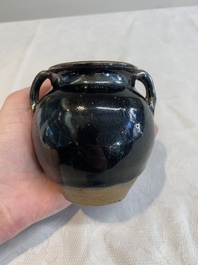 A Chinese brown-glazed vase and a black-glazed jar, Song/Ming
