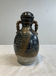 A Chinese brown-glazed vase and a black-glazed jar, Song/Ming