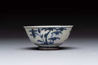 Four Chinese blue and white bowls, two cups and a plate, Ming