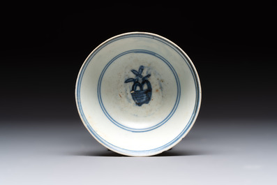 Four Chinese blue and white bowls, two cups and a plate, Ming