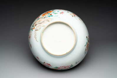 A large Chinese famille rose punch bowl with flowering and fruiting branches, Qianlong